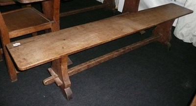 Lot 1683 - A Pair of Martin "Lizardman" Dutton Oak 6' Benches, each with shaped supports joined by a...