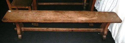 Lot 1684 - A Pair of Martin "Lizardman" Dutton Oak 6' Benches, each with shaped supports joined by a...