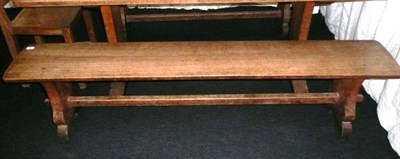 Lot 1685 - A Pair of Martin "Lizardman" Dutton Oak 6' Benches, each with shaped supports joined by a...