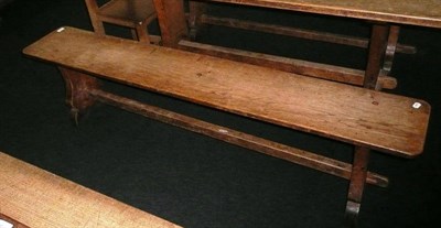 Lot 1687 - A Pair of Martin "Lizardman" Dutton Oak 6' Benches, each with shaped supports joined by a...