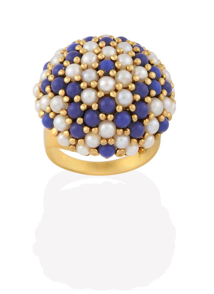 Lot 2004 - A Cultured Pearl and Blue Bead Ring, the bombé bezel formed of cultured pearls and blue beads in a