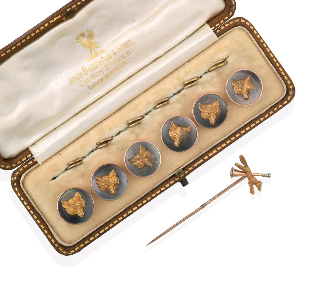 Lot 2009 - A Cased Set of Six Edwardian Mother-of-Pearl Fox Mask Buttons, each circular plaque formed of...