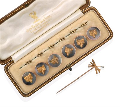 Lot 2009 - A Cased Set of Six Edwardian Mother-of-Pearl Fox Mask Buttons, each circular plaque formed of...
