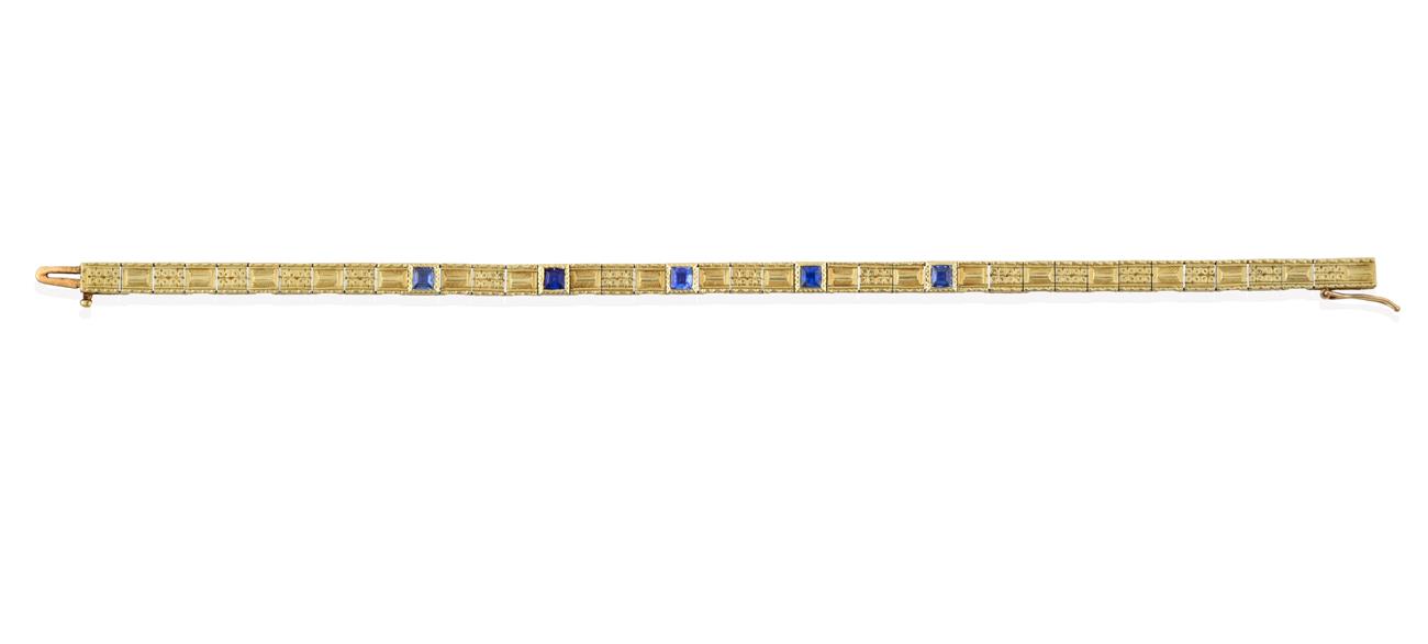 Lot 2015 - An Early 20th Century Sapphire Bracelet, the articulated yellow plaque links bright-cut...