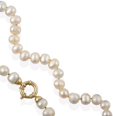 Lot 2030 - A Single Row Cultured Pearl Necklace, the forty-four irregular shaped cultured pearls knotted...