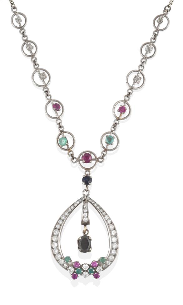 Lot 2034 - A Ruby, Sapphire, Emerald and Diamond Necklace, an eight-cut diamond set loop with an oval cut...
