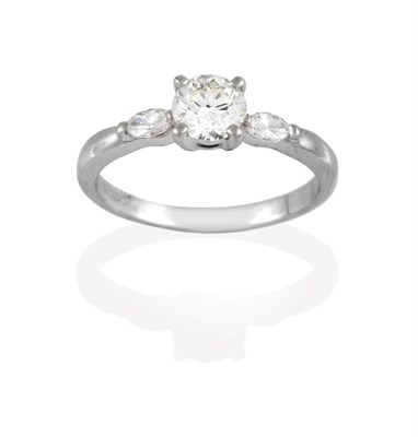 Lot 2039 - A Platinum Diamond Solitaire Ring, the round brilliant cut diamond in a claw setting, to...