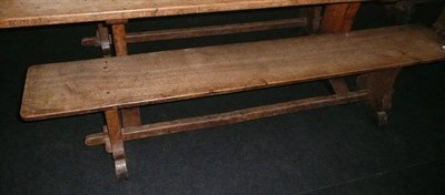 Lot 1695 - A Pair of Martin "Lizardman" Dutton Oak 6' Benches, each with shaped supports joined by a...