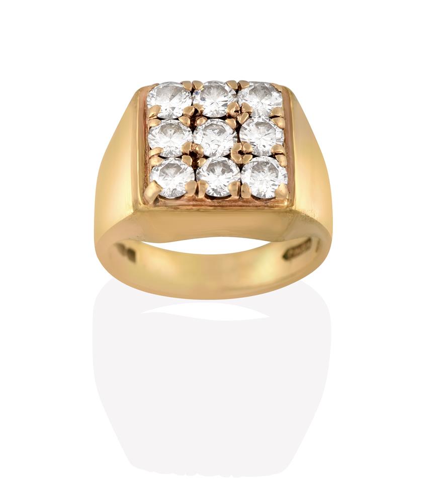 Lot 2058 - A 9 Carat Gold Diamond Cluster Ring, nine round brilliant cut diamonds in a square arrangement,...