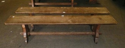 Lot 1697 - A Pair of Martin "Lizardman" Dutton Oak 6' Benches, each with shaped supports joined by a...