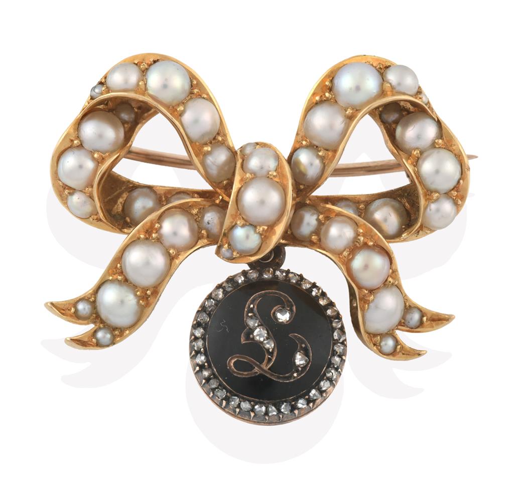 Lot 2066 - An Edwardian Split Pearl Brooch with Diamond Mourning Pendant, the bow motif set throughout...