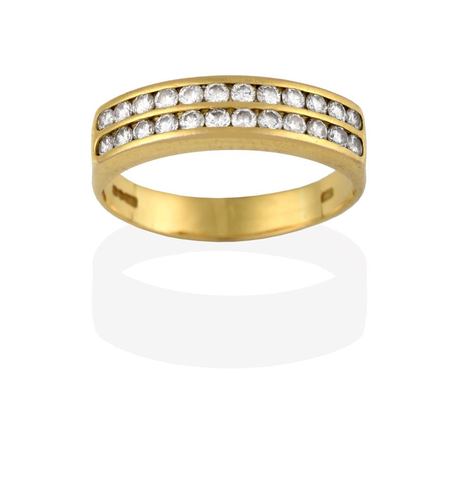 Lot 2078 - An 18 Carat Gold Diamond Half Hoop Ring, the two rows of round brilliant cut diamonds in yellow...
