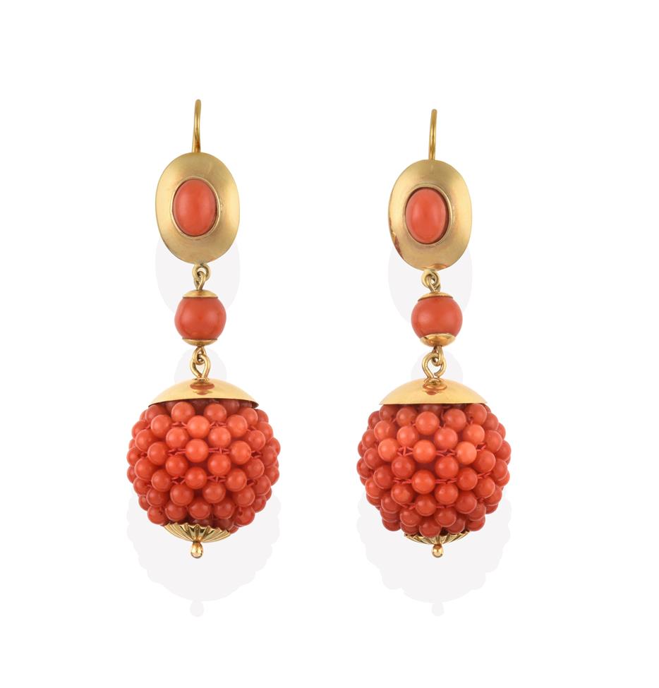 Lot 2083 - A Pair of Coral Drop Earrings, the oval cabochon coral in a yellow rubbed over setting within a...