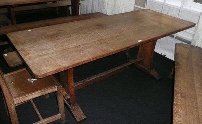 Lot 1700 - A Martin "Lizardman" Dutton Oak 6' Refectory Table, on two shaped end supports joined by a...