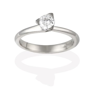 Lot 2090 - A Platinum Diamond Solitaire Ring, the round brilliant cut diamond in a claw setting, to...