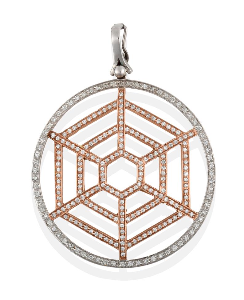 Lot 2091 - A Diamond Pendant, the openwork spider web motif formed of a central rose section to a white...