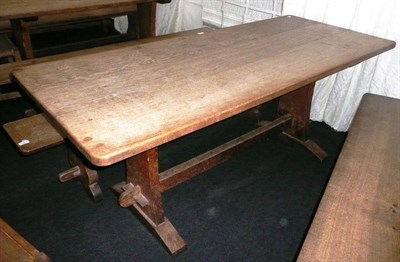 Lot 1701 - A Martin "Lizardman" Dutton Oak 6' Refectory Table, on two shaped end supports joined by a...