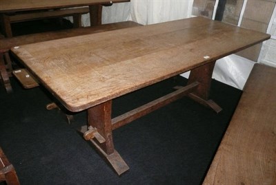 Lot 1703 - A Martin "Lizardman" Dutton Oak 6' Refectory Table, on two shaped end supports joined by a...