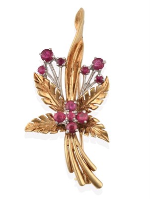 Lot 2134 - A 9 Carat Gold Ruby Brooch, realistically modelled as a floral spray, the yellow textured...