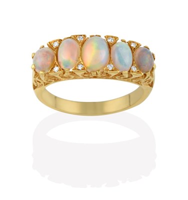 Lot 2138 - An Opal and Diamond Ring, the five graduated oval cabochon opals with eight-cut diamond accents, in
