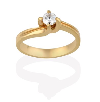 Lot 2139 - A Diamond Solitaire Ring, the round brilliant cut diamond in a yellow four claw setting, to an...