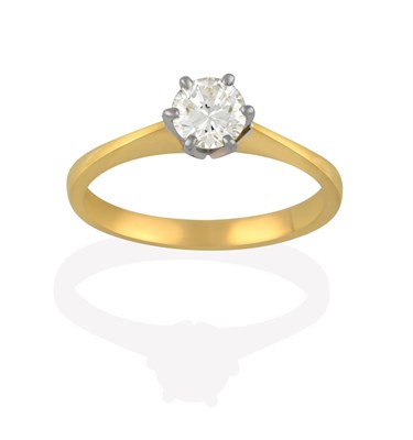 Lot 2140 - An 18 Carat Gold Diamond Solitaire Ring, the round brilliant cut diamond in a white claw...