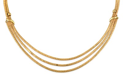Lot 2146 - A Fancy Brick Link Necklace, two rows of yellow brick links split into three graduated rows to...