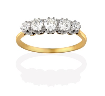 Lot 2162 - A Diamond Five Stone Ring, the old cut diamonds in white claw settings, to a yellow tapered...