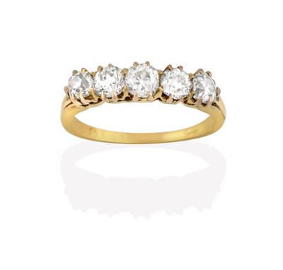 Lot 2166 - A Diamond Five Stone Ring, the old cut diamonds in yellow claw settings, to a tapered shoulder...
