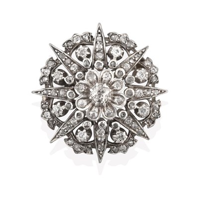 Lot 2174 - A Late 19th Century Diamond Brooch, of cluster star design, an old cut diamond centrally to a...