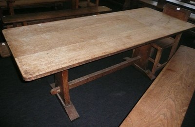 Lot 1709 - A Martin "Lizardman" Dutton Oak 6' Refectory Table, on two shaped end supports joined by a...