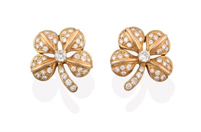 Lot 2180 - A Pair of Diamond Earrings, realistically modelled as floral motifs, set throughout with round...