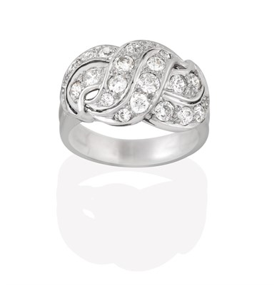 Lot 2207 - A Diamond Cluster Ring, of openwork scroll design, set throughout with round brilliant cut diamonds