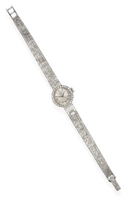 Lot 2210 - A Lady's 9 Carat White Gold Diamond Set Wristwatch, signed Tudor, model: Royal, 1968, lever...