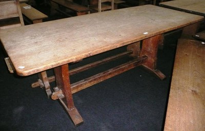 Lot 1713 - A Martin "Lizardman" Dutton Oak 6' Refectory Table, on two shaped end supports joined by a...