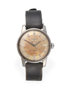 Lot 2221 - A Stainless Steel Automatic Centre Seconds Wristwatch, signed Longines, model: Conquest, circa...
