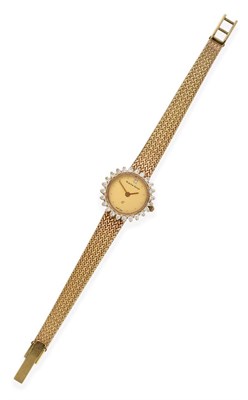 Lot 2228 - A Lady's 9 Carat Gold Diamond Set Wristwatch, signed Bueche-Girod, circa 1980, quartz movement,...