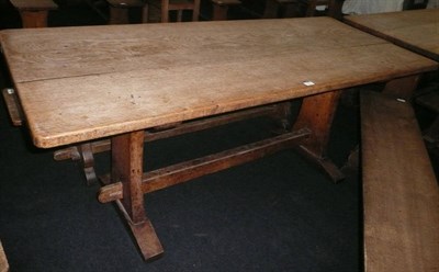 Lot 1715 - A Martin "Lizardman" Dutton Oak 6' Refectory Table, on two shaped end supports joined by a...