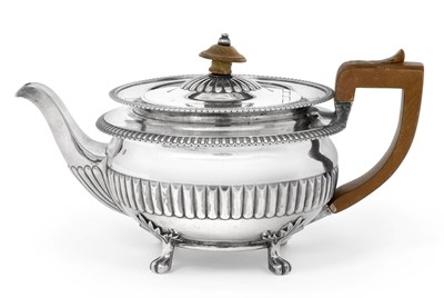 Lot 2277 - A George III Silver Teapot, by John Foskett and John Stewart, London, 1809, circular and on...
