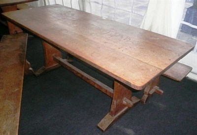 Lot 1719 - A Martin "Lizardman" Dutton Oak 6' Refectory Table, on two shaped end supports joined by a...