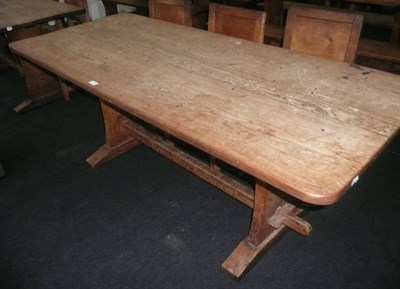 Lot 1720 - A Martin "Lizardman" Dutton Oak 6' Refectory Table, on two shaped end supports joined by a...