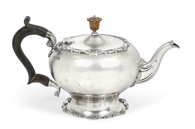 Lot 2364 - A George V Silver Teapot, by Russells Ltd., London, 1916, baluster and on spreading shaped...