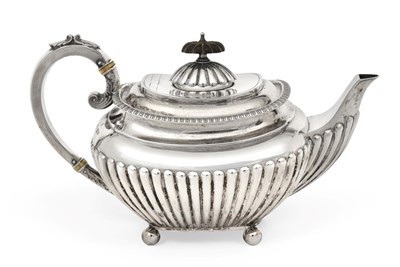 Lot 2373 - An Edward VII Silver Teapot, by James Dixon and Sons, Sheffield, 1909, oblong and on four ball...