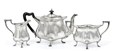 Lot 2374 - A Three-Piece Edward VII Silver Tea-Service, by Sheffield, 1904, by Hawksworth, Eyre and Co....