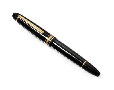 Lot 2393 - A Montblanc Meisterstück Fountain-Pen, Numbered GB1135429, the bi-colour nib engraved with foliage