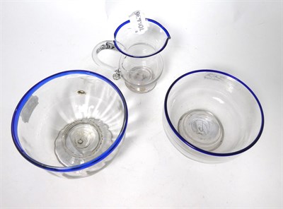 Lot 3 - A Glass Cream Jug and Sugar Bowl, circa 1800, of fluted form with blue glass rims, jug 11cm...