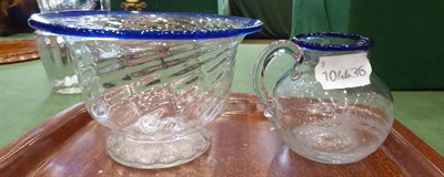 Lot 4 - A Glass Sugar Bowl, circa 1800, of wrythen fluted ogee form with blue glass rim, 8.5cm high; A...