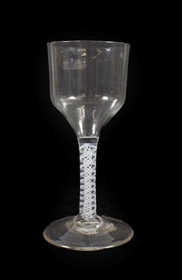 Lot 12 - A Glass Goblet, circa 1750, the ogee bowl on an opaque twist stem and circular foot, 21cm high