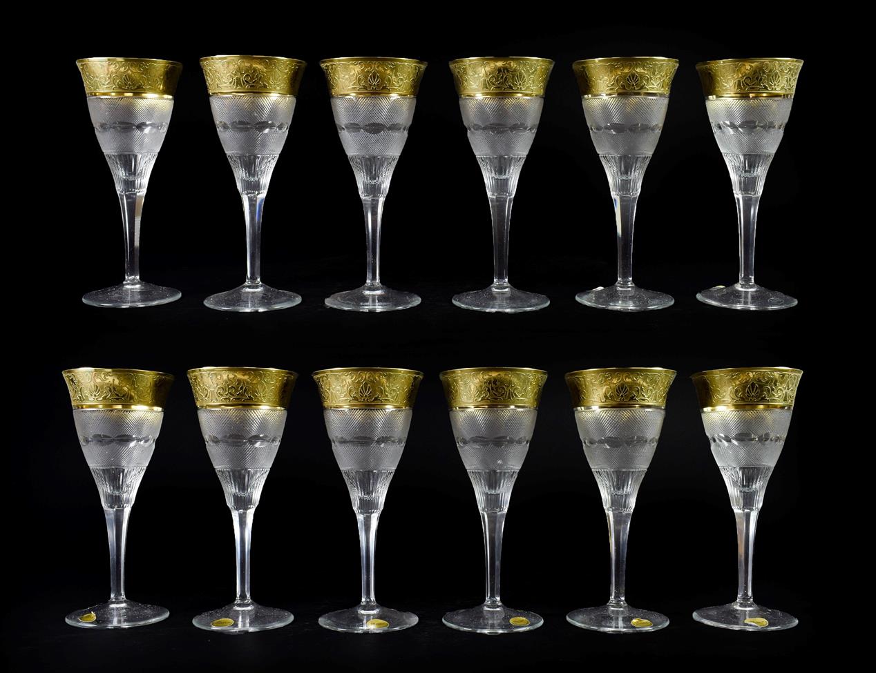 Lot 17 - A Set of Twelve Moser Wine Glasses, late 20th century, with etched gilt rims over bands of...