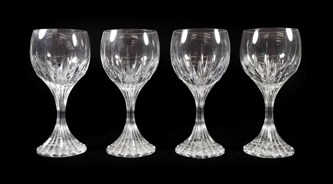 Lot 20 - A Set of Four Baccarat Wine Glasses, modern, Massena pattern, with fluted oval bowls, waisted stems